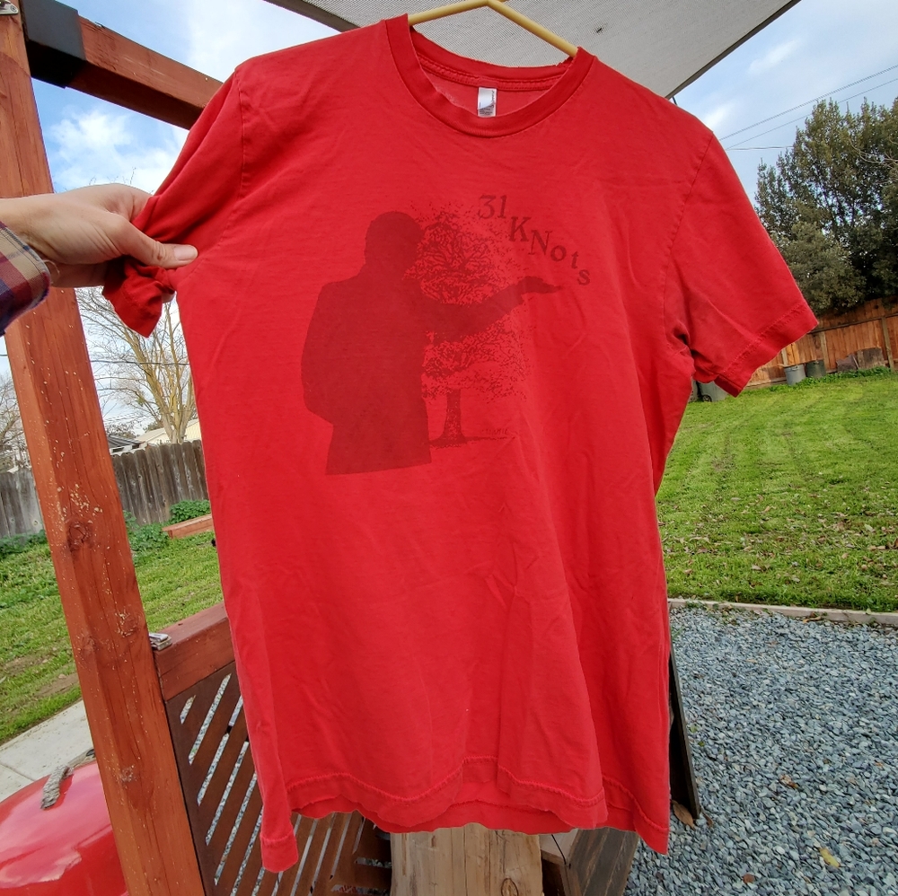 31 Knots Band T-shirt. Red. Medium. Some tatter/holes. 2011 Tour approx.